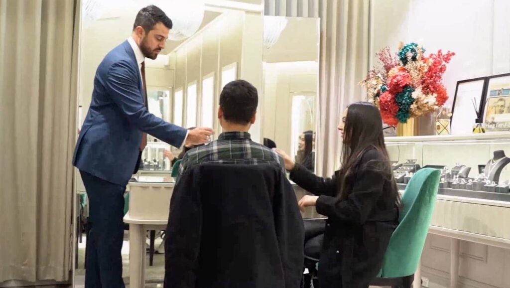 woman looking at a custom engagement ring